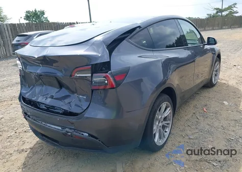 2023 Tesla Model Y Awd/Long Range Dual Motor All-Wheel Drive z USA, uszkodzony, nr VIN 7SAYGDEE5PF895364